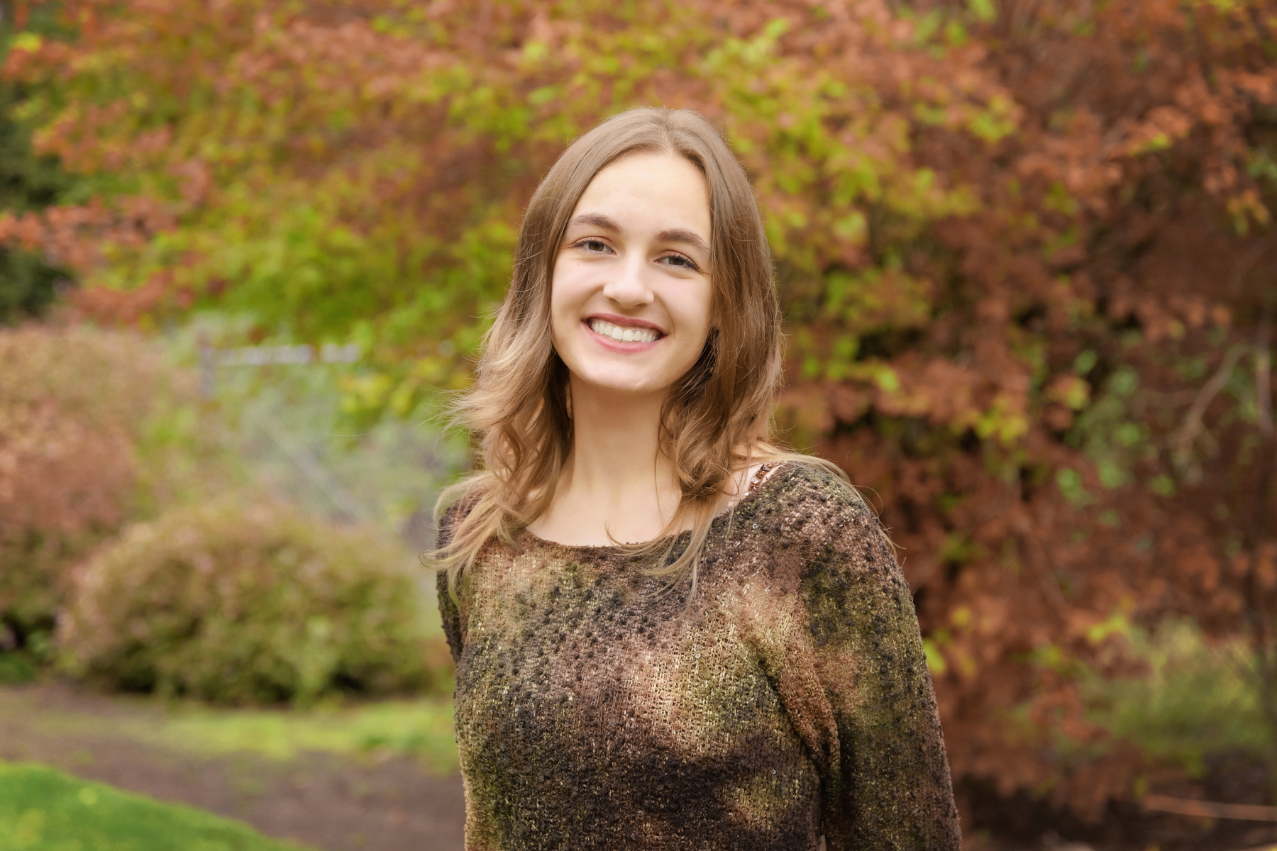 woman smiling in the outdoors